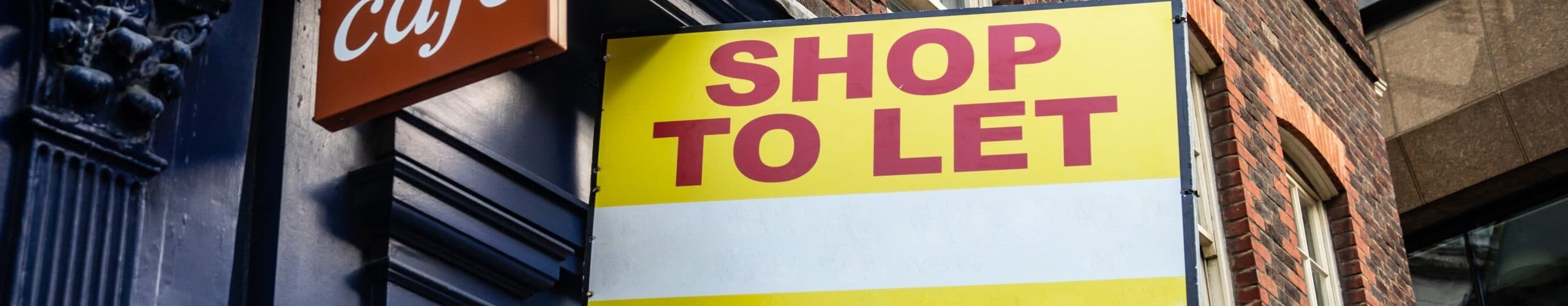 Shop,To,Let,Sign,On,Side,Of,Vacant,Food,Retail